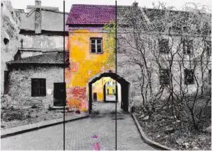 A vibrant painting of a yellow and pink building with a gate