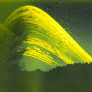 A captivating photo featuring a yellow wave, representing the sun's journey over a duration of six months