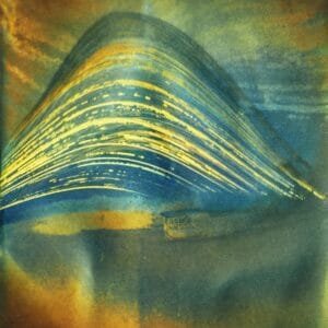 Rusty photopaper with yellow photo, weathered by sun exposure over six months